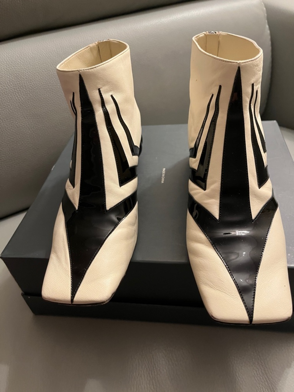 CHANEL Black and Cream Striped Leather Round-Heel Pumps